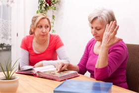 Caregiver and a lonely woman during a bereavement process